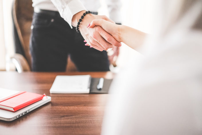 business-man-and-woman-handshake-in-work-office-picjumbo-com business man and woman handshake in work office picjumbo com